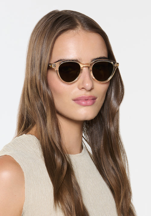 BARRETT | Haze + Iberia Polarized Handcrafted, luxury champagne and brown tortoise acetate round KREWE polarized sunglasses womens model | Model: Sam