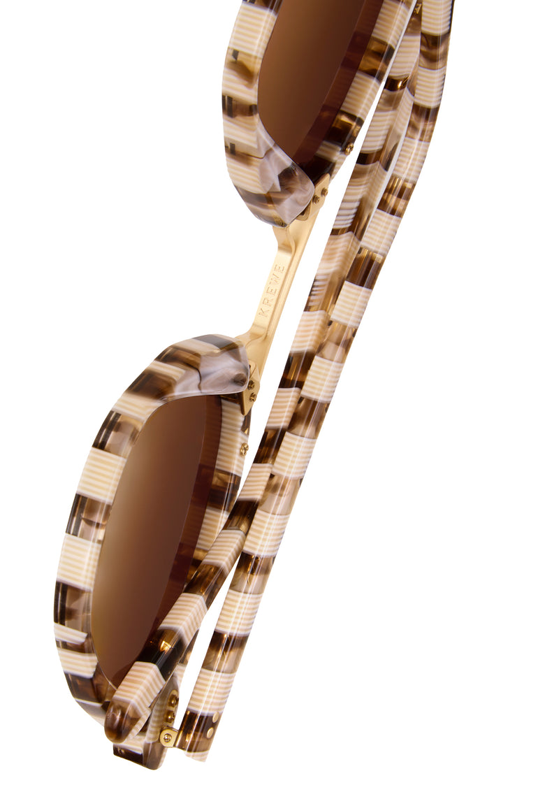 BEAU NYLON | Shepards Check 18K Handcrafted, luxury brown checkered acetate KREWE sunglasses with gold bridge and hardware and flat edge to edge nylon lens