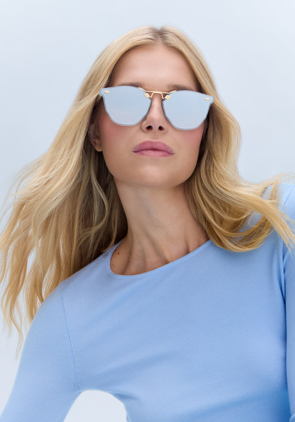 BEAU NYLON | Powder Blue 18K Handcrafted, luxury, blue square acetate with gold bridge and hardware and flat edge to edge nylon lens KREWE sunglasses womens model | Model: Emily U.