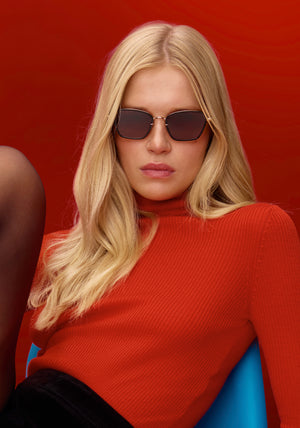 BELLA | 12K + Black + Black Tea Handcrafted, luxury black acetate and stainless steel cat-eye KREWE sunglasses womens model | Model: Emilie