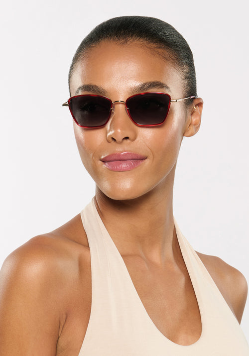 BELLA | 12K + Sangria Handcrafted, luxury red acetate and stainless steel cat-eye KREWE sunglasses womens model | Model: Sasha