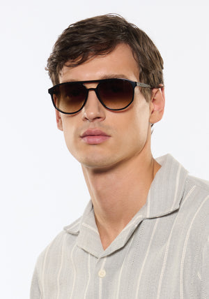 BRANDO | Black + Black Tea Handcrafted, luxury black acetate KREWE sunglasses mens model campaign | Model: Jegor