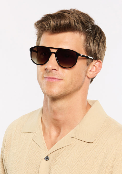 BRANDO | Black + Black Tea Handcrafted, luxury black acetate KREWE sunglasses mens model campaign | Model: Ben