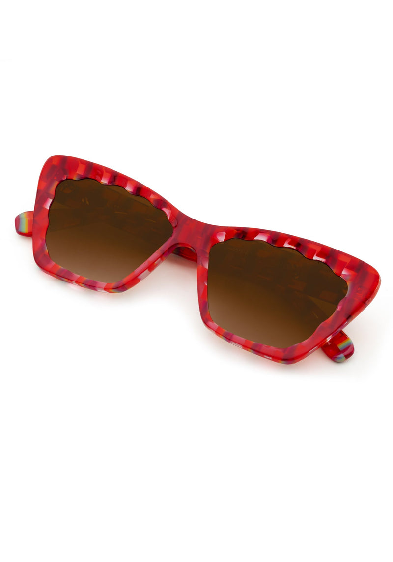 BRIGITTE | Cherry over Fierte Handcrafted, luxury red and rainbow checkered scalloped cat-eye KREWE sunglasses