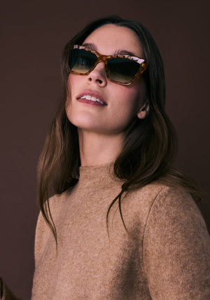 BRIGITTE | Fernet Handcrafted, luxury brown tortoise scalloped cat-eye KREWE sunglasses womens model campaign | Model: Eliza