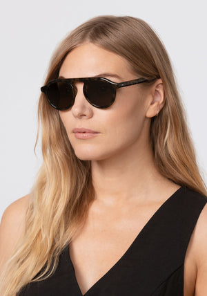 CAMERON | Tortuga Polarized Handcrafted, luxury dark brown acetate round aviator KREWE sunglasses womens model | Model: Maritza