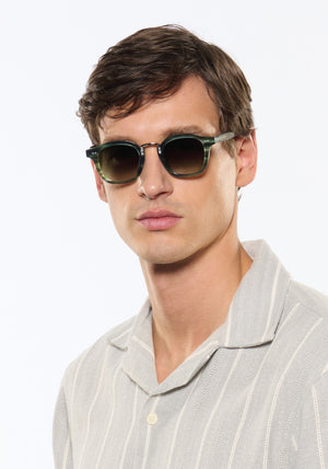 CAMPBELL | Reed 18K Handcrafted, luxury green tortoise acetate medium round KREWE sunglasses with stainless steel metal hardware mens model | Model: Jegor