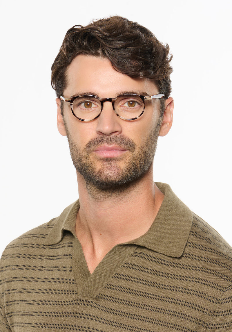 CARSON | Blonde Venezia Handcrafted, luxury brown tortoise acetate small round KREWE eyeglasses mens model | Model: Ryan A.