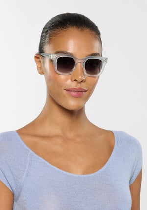 CELESTE | Handcrafted, luxury powder blue medium sized square cat eye KREWE sunglasses womens model | Model: Sasha