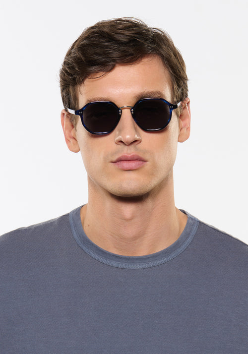 DAKOTA | Indigo Tortoise Silver Polarized Handcrafted, luxury, dark blue tortoise acetate polarized KREWE sunglasses with silver bridge and hardware mens model | Model: Jegor
