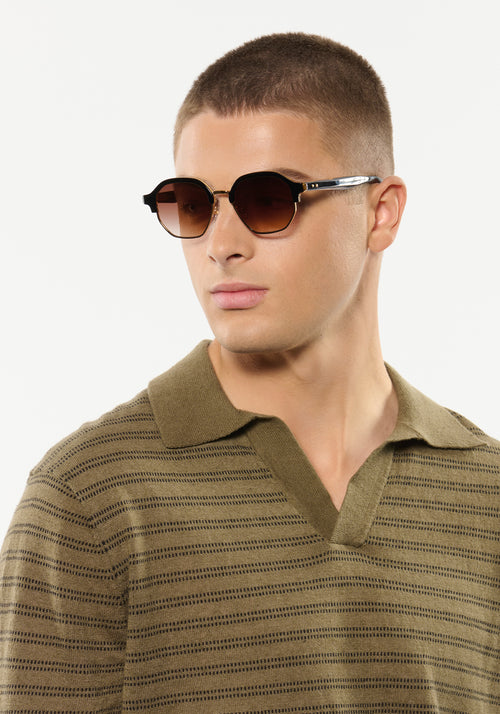 DAKOTA REVIVAL | Black Tea 18K Handcrafted, luxury black acetate geometric KREWE sunglasses mens model | Model: Joey
