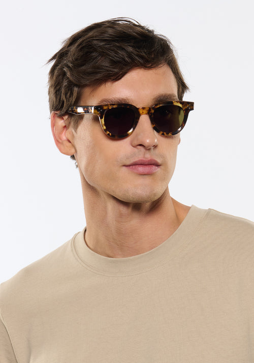 DEVON | Nikko Tortoise Handcrafted, luxury brown tortoise acetate round classic KREWE sunglasses mens model | Model: Jacob