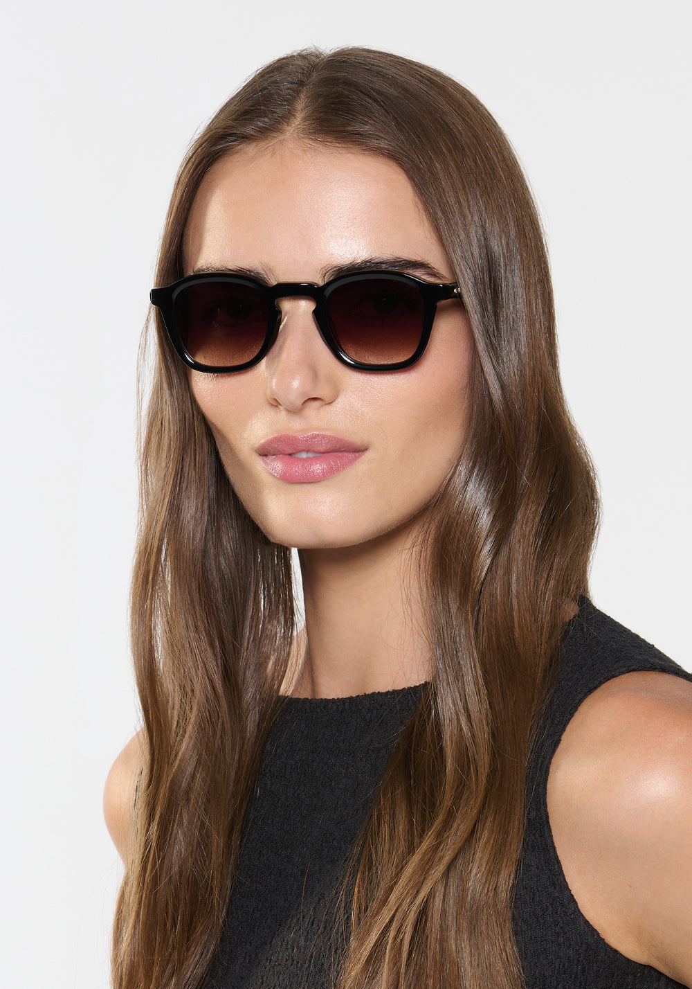 DYLAN | Black + Black Tea Handcrafted, luxury black acetate square classic KREWE sunglasses womens model | Model: Sam
