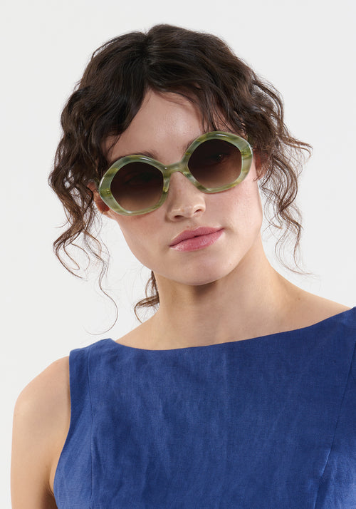 ELIZA | Selene Handcrafted, luxury light green acetate round geometric KREWE sunglasses womens model | Model: Ione
