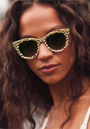ELLIE | Yuzu Handcrafted, luxury yellow green checkered acetate round scalloped edge KREWE sunglasses womens model campaign | Model: Morgan