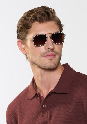EMERY | 18K + Matte Domino Handcrafted, luxury black and white spotted acetate and stainless steel aviator KREWE sunglasses mens model | Model: Linus