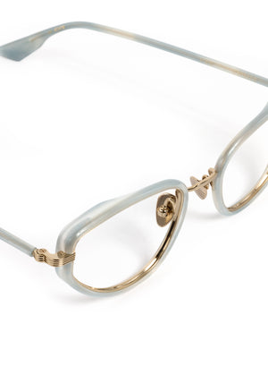 ESTELLE | 12K Titanium + Salinity Handcrafted, luxury light blue acetate and metal cat-eye KREWE eyeglasses 