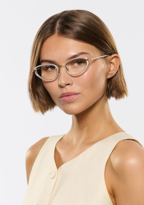 ESTELLE | 12K Titanium + Salinity Handcrafted, luxury light blue acetate and metal cat-eye KREWE eyeglasses womens model | Model: Michelle