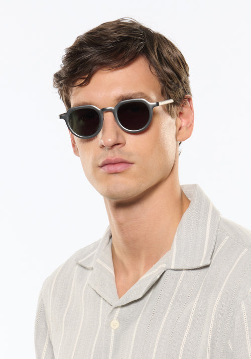 GALVAN| Handcrafted, luxury matte and chrome acetate medium sized geometric KREWE sunglasses mens model | Model: Jegor