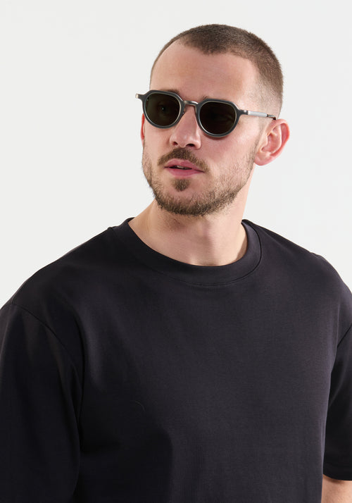 GALVAN| Handcrafted, luxury matte and chrome acetate medium sized geometric KREWE sunglasses mens model | Model: Connor