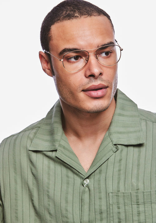 HARPER | 18K Matte Black Fade + Poppy Noir Handcrafted, luxury stainless steel aviator KREWE eyeglasses with multicolored acetate temple tips mens model | Model: Jeffrey