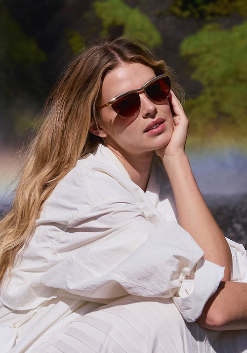 HEIDI | 12K Matte Black Fade Chroma + Blonde Venezia Handcrafted, luxury matte black fade chroma stainless steel large cat eye KREWE sunglasses womens model | Model: Frederique