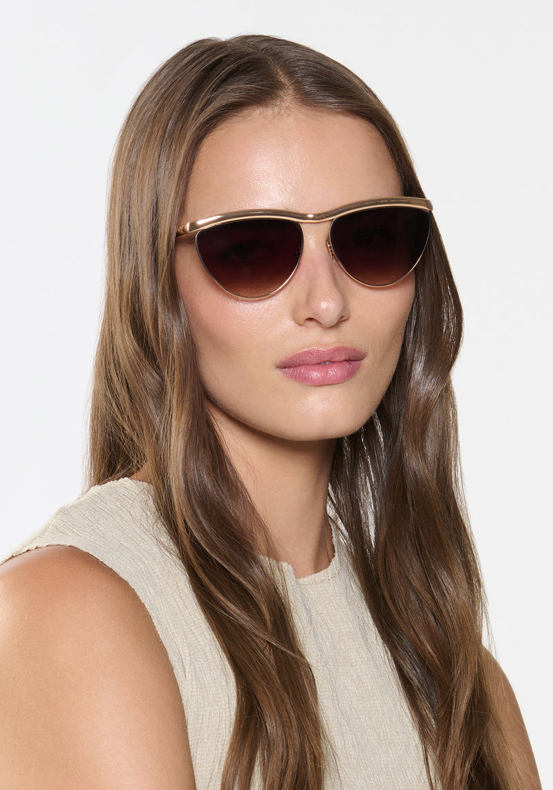 HEIDI | 12K Matte Black Fade Chroma + Blonde Venezia Handcrafted, luxury matte black fade chroma stainless steel large cat eye KREWE sunglasses womens model | Model: Sam
