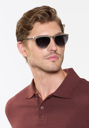 HEIDI | Silver Chroma + Tortuga Noir Handcrafted, luxury silver chroma stainless steel large cat eye KREWE sunglasses mens model | Model: Linus
