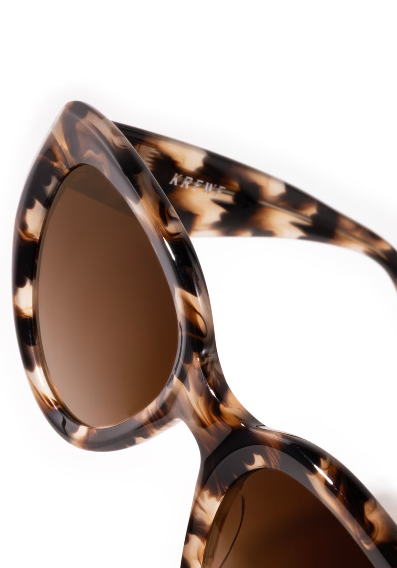 IRENE | Blonde Venezia Handcrafted, luxury brown tortoise acetate medium sized upswept oval wrap KREWE sunglasses