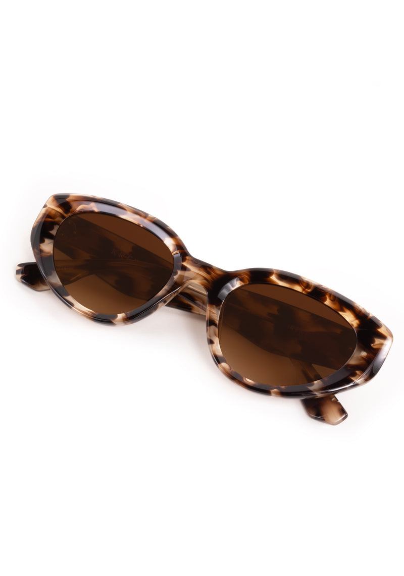 IRENE | Blonde Venezia Handcrafted, luxury brown tortoise acetate medium sized upswept oval wrap KREWE sunglasses