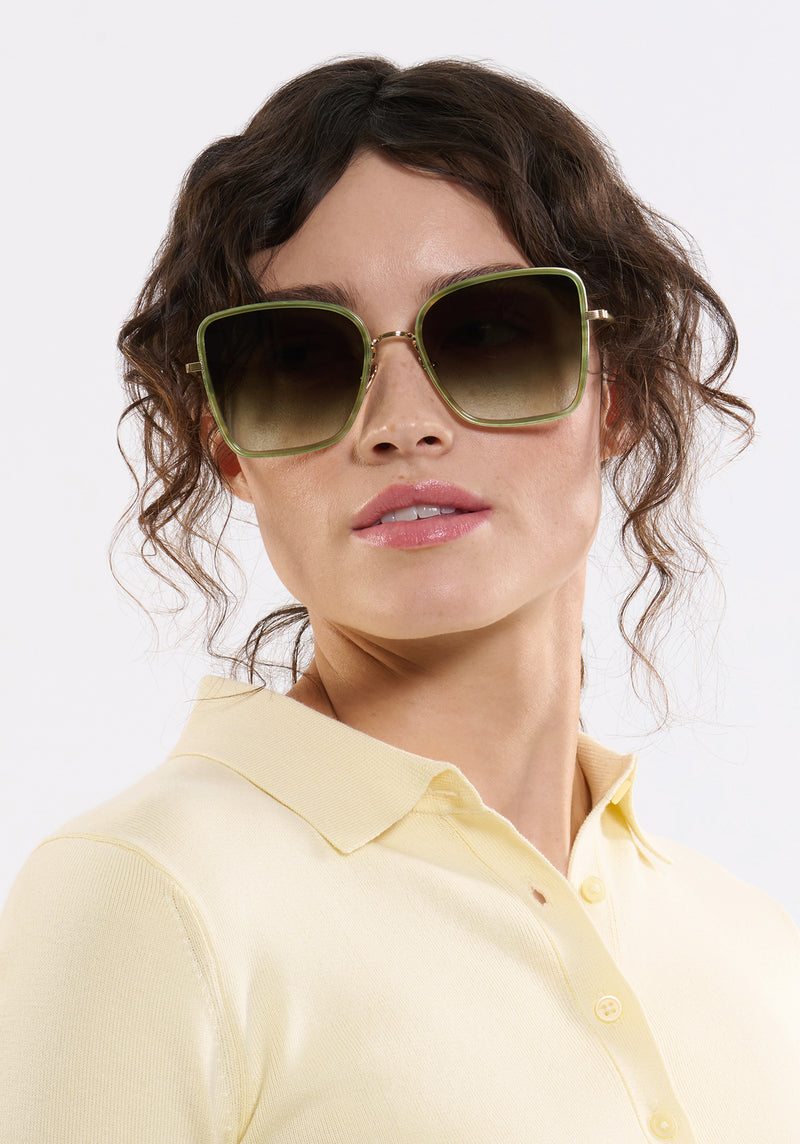 JOLENE | 12K Titanium + Selene Handcrafted, luxury titanium and light green acetate oversized butterfly KREWE sunglasses womens model | Model: Ione