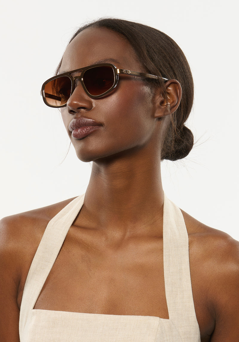 JORDAN | Bronze Metallic + 12K Handcrafted, luxury brown metallic  acetate KREWE aviator sunglasses womens model | Model: Brenda