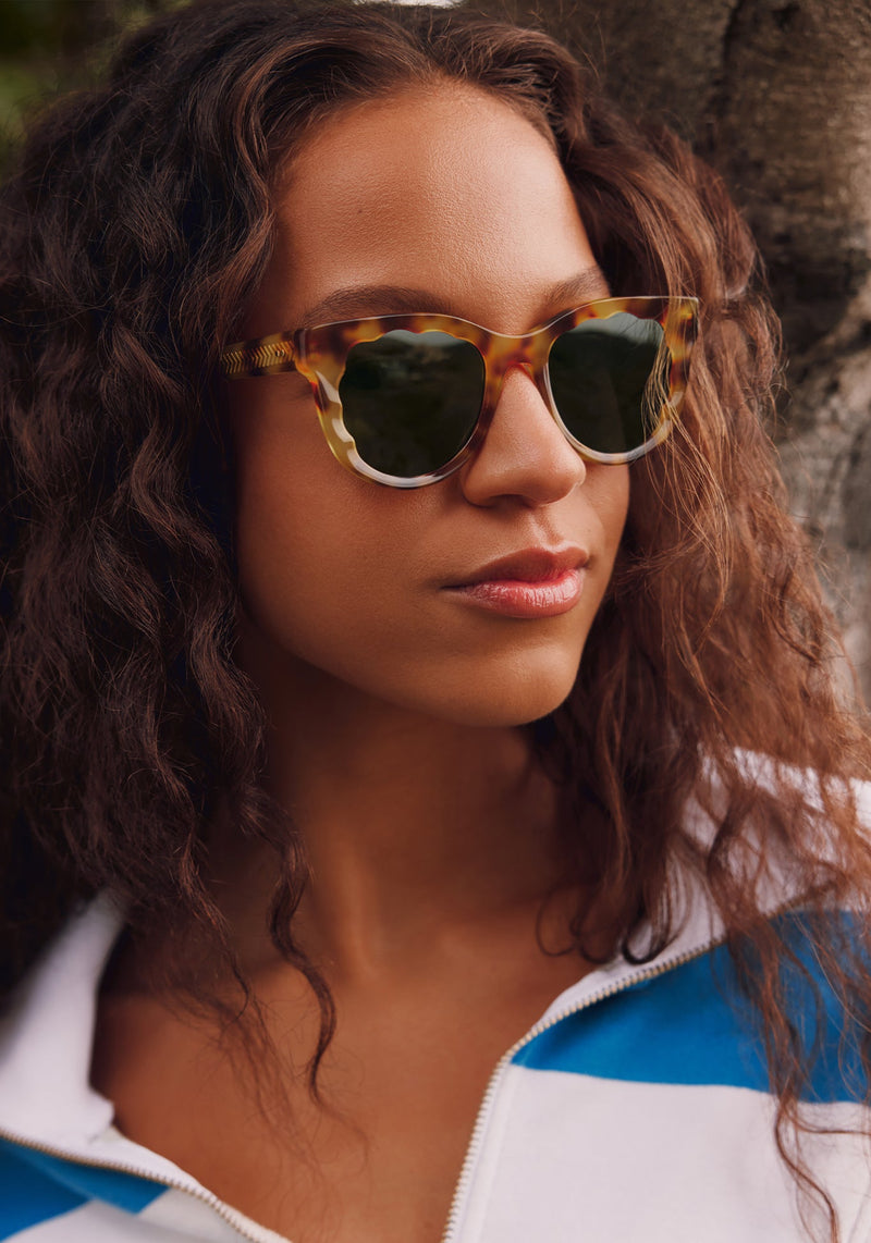ELLIE | Hawksbill Handcrafted, luxury brown tortoise acetate round scalloped edge KREWE sunglasses womens model campaign | Model: Morgan