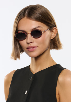 KATE | 12K + Bordeaux Handcrafted, luxury burgundy acetate and stainless steel small oval KREWE sunglasses womens model | Model: Michelle
