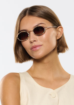 KATE | 18K + Granita Handcrafted, luxury speckled multicolored acetate and stainless steel small oval KREWE sunglasses womens model | Model: Michelle