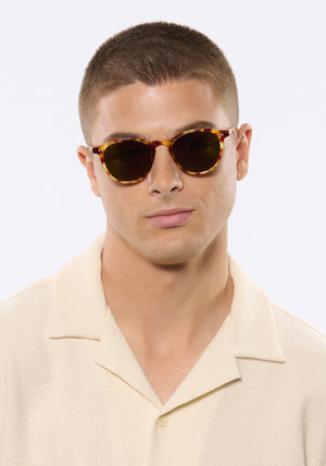 LANDRY | Hawksbill Handcrafted, luxury brown tortoise acetate round KREWE sunglasses  mens model | Model: Joey