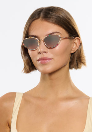 LEAH | 18K + Gelato Mirrored Handcrafted, luxury multicolored tortoise acetate and stainless steel cat-eye KREWE sunglasses womens model | Model: Michelle
