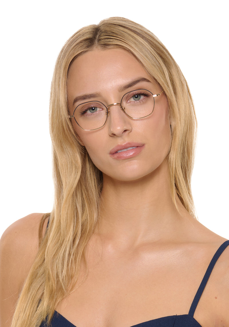 MARCEL | 18K Matte Black Fade Titanium handcrafted, luxury 18K black gold metal round KREWE eyeglasses womens model | Model: Isabelle