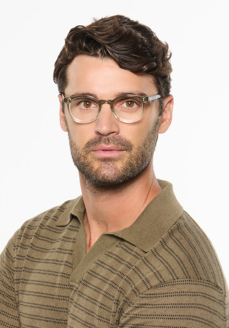 MARENGO | Sandstone Handcrafted luxury beige acetate small round KREWE eyeglasses mens model | Model: Ryan A.