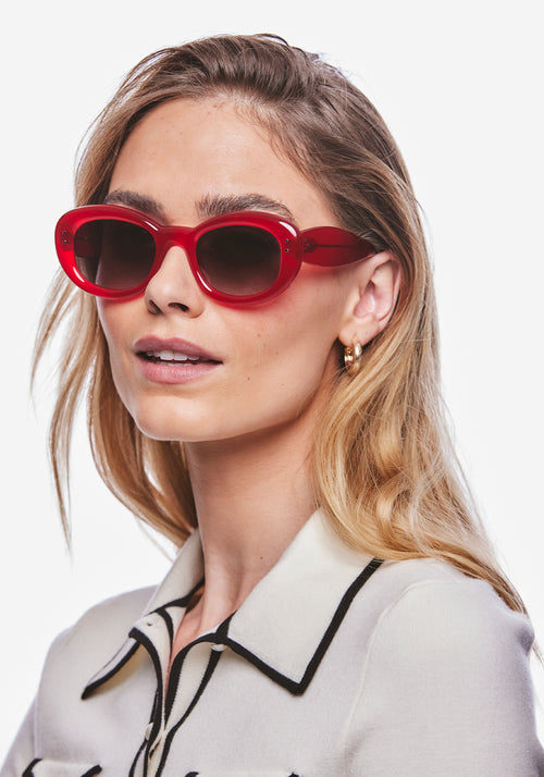 MARGARET | Cherry Handcrafted, luxury red acetate medium sized oval bubble frame KREWE sunglasses womens model | Model: Meghan