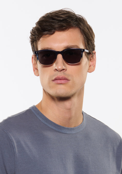 MATTHEW | Comet + Twilight Handcrafted, luxury navy and light brown acetate KREWE sunglasses mens model | Model: Jegor