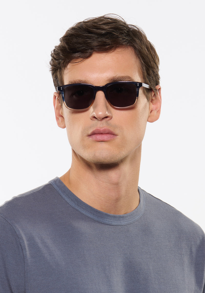 MATTHEW | Comet + Twilight Handcrafted, luxury navy and light brown acetate KREWE sunglasses mens model | Model: Jegor
