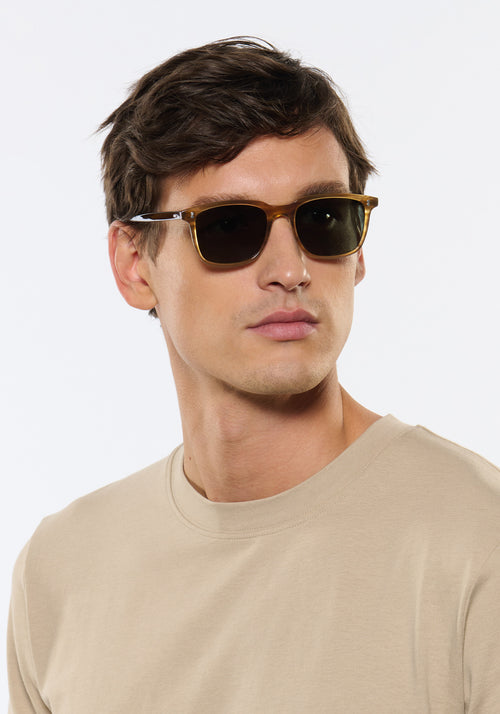MATTHEW | Umber Polarized Handcrafted, brown tan acetate square rectangle polarized KREWE sunglasses mens model | Model: Jegor