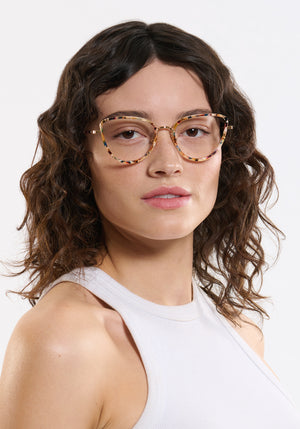 MIA | 18K Titanium + Capri Handcrafted, luxury multicolored acetate and metal cat-eye KREWE eyeglasses womens model campaign | Model: Ione