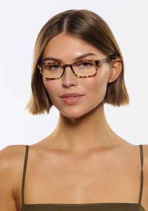 MORGAN | Nikko Tortoise Handcrafted, luxury brown and yellow tortoise acetate rectangular KREWE eyeglasses womens model | Model: Michelle