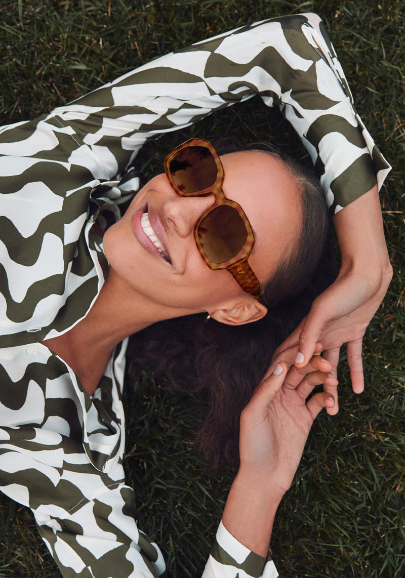 NAOMI | Fernet Handcrafted, luxury brown checkered tortoise acetate oversized geometric wrap KREWE sunglasses womens model campaign | Model: Morgan