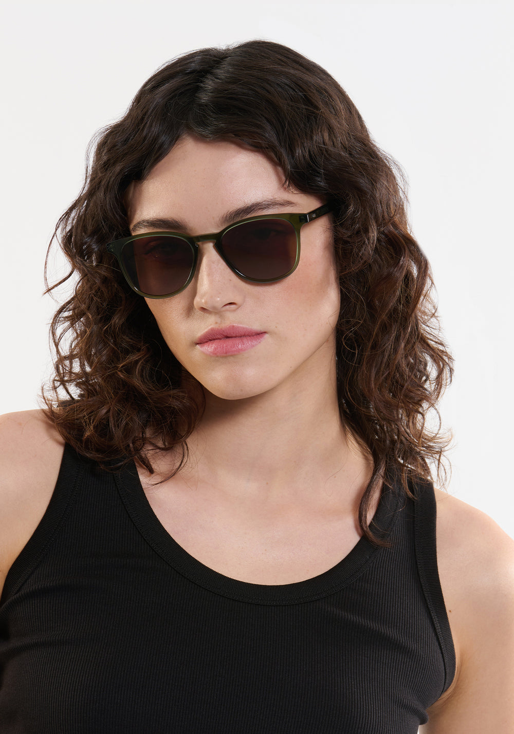 OLIVIER | Bottle Green Handcrafted, luxury green acetate round KREWE sunglasses womens model | Model: Ione