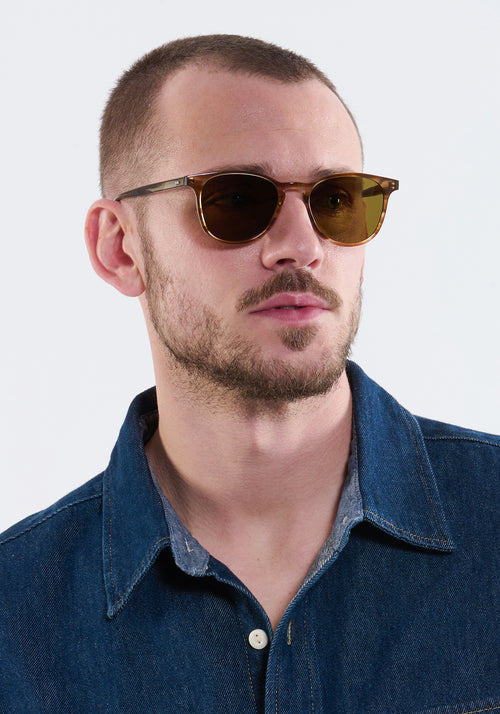 OLIVIER | Kombu Handcrafted, luxury brown acetate round KREWE sunglasses mens model | Model: Connor