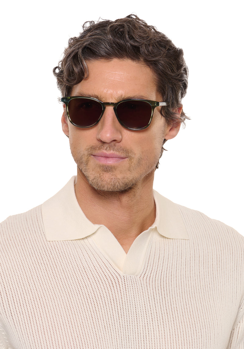 OLIVIER | Reed Handcrafted, luxury green tortoise acetate round KREWE sunglasses mens model | Model: Ryan
