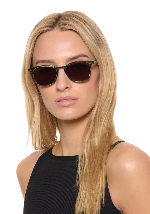 OLIVIER | Reed Handcrafted, luxury green tortoise acetate round KREWE sunglasses womens model | Model: Isabelle